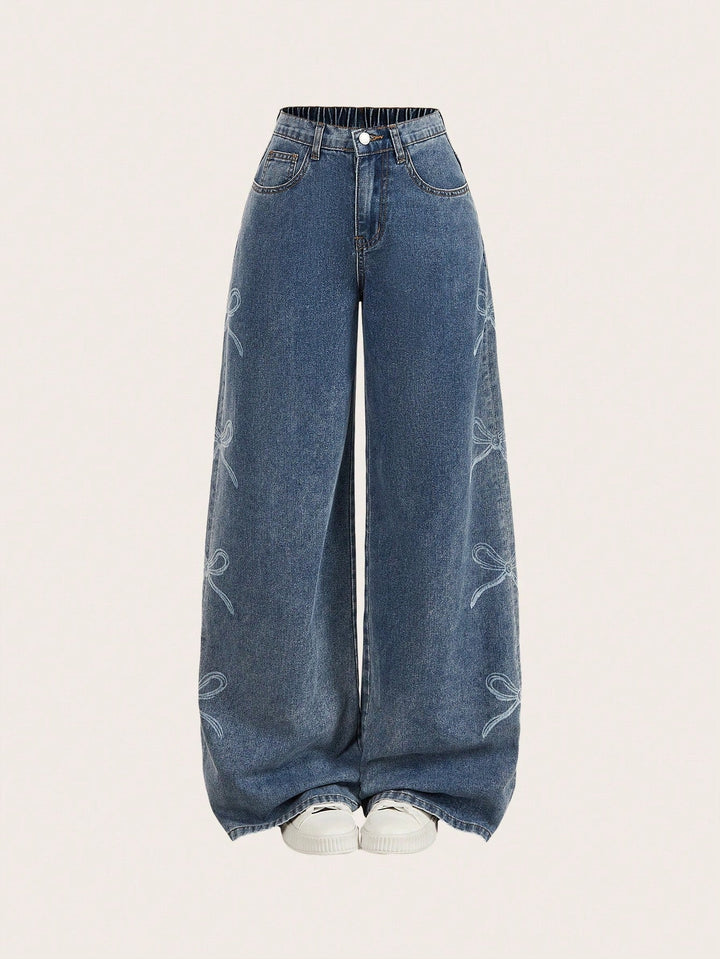 Loose Fit Blue Denim Jeans with Grinding Detail for Casual Stylish Looks
