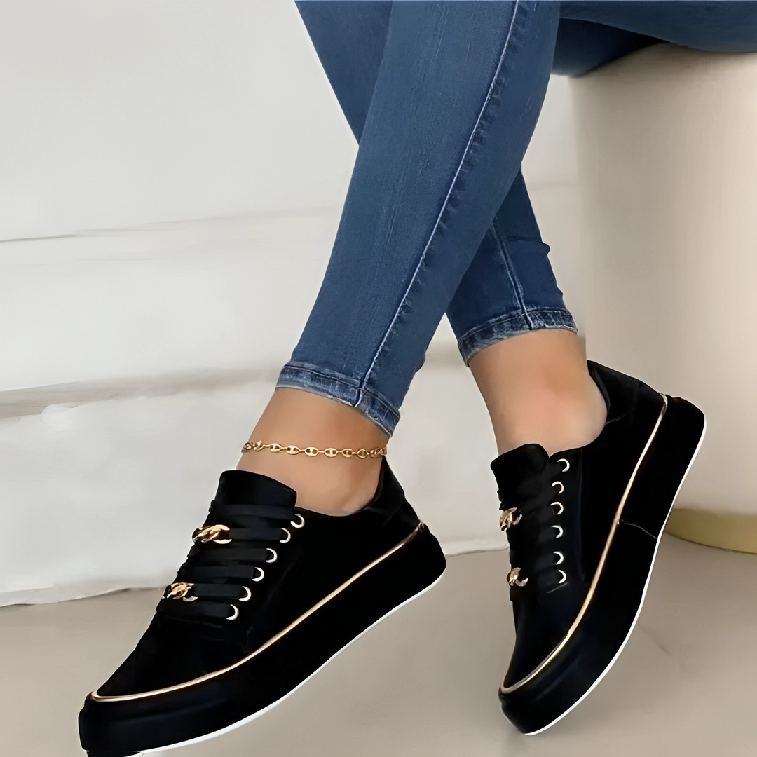 Trendy Black Low-Top Sneakers with Gold Accents for All-Day Comfort and Durable PU Leather Construction