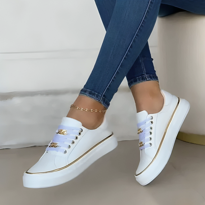 Trendy Black Low-Top Sneakers with Gold Accents for All-Day Comfort and Durable PU Leather Construction