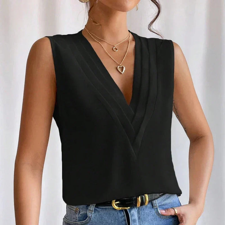 Lightweight &amp; flattering women’s blouse – sleeveless pleated design, high-quality fabric, for elegant occasions
