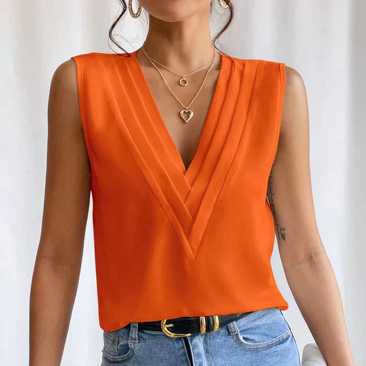 Lightweight &amp; flattering women’s blouse – sleeveless pleated design, high-quality fabric, for elegant occasions