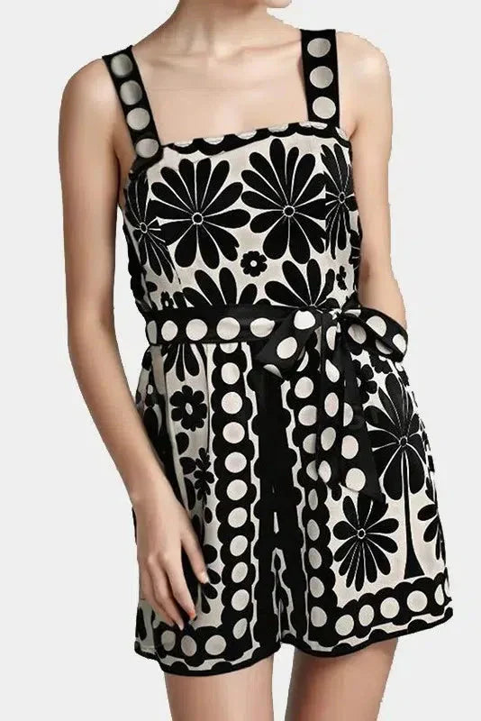 Vintage Floral Polka Dot Romper with Smocked Back, Square Neckline, and Slanted Pockets in Black and White
