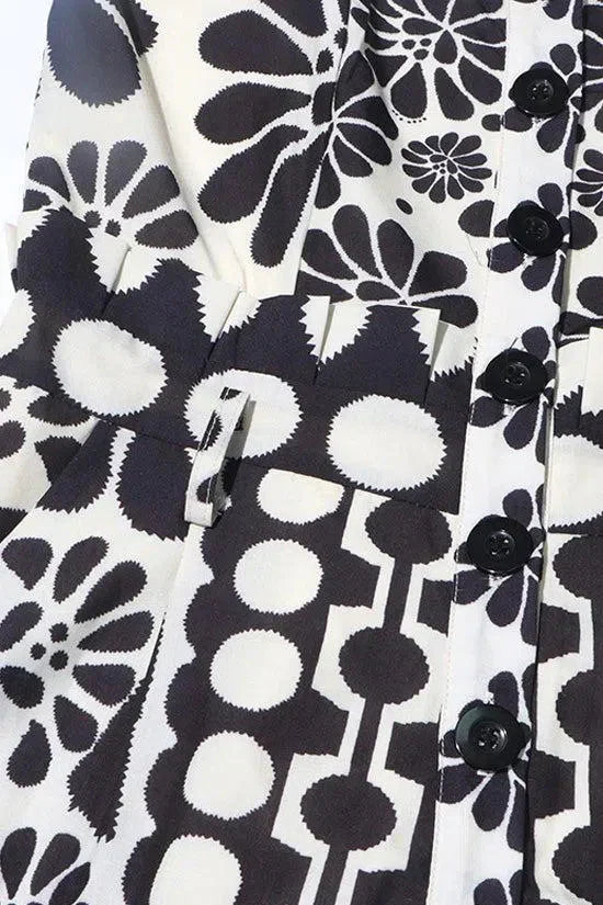 Vintage Floral Polka Dot Romper with Smocked Back, Square Neckline, and Slanted Pockets in Black and White