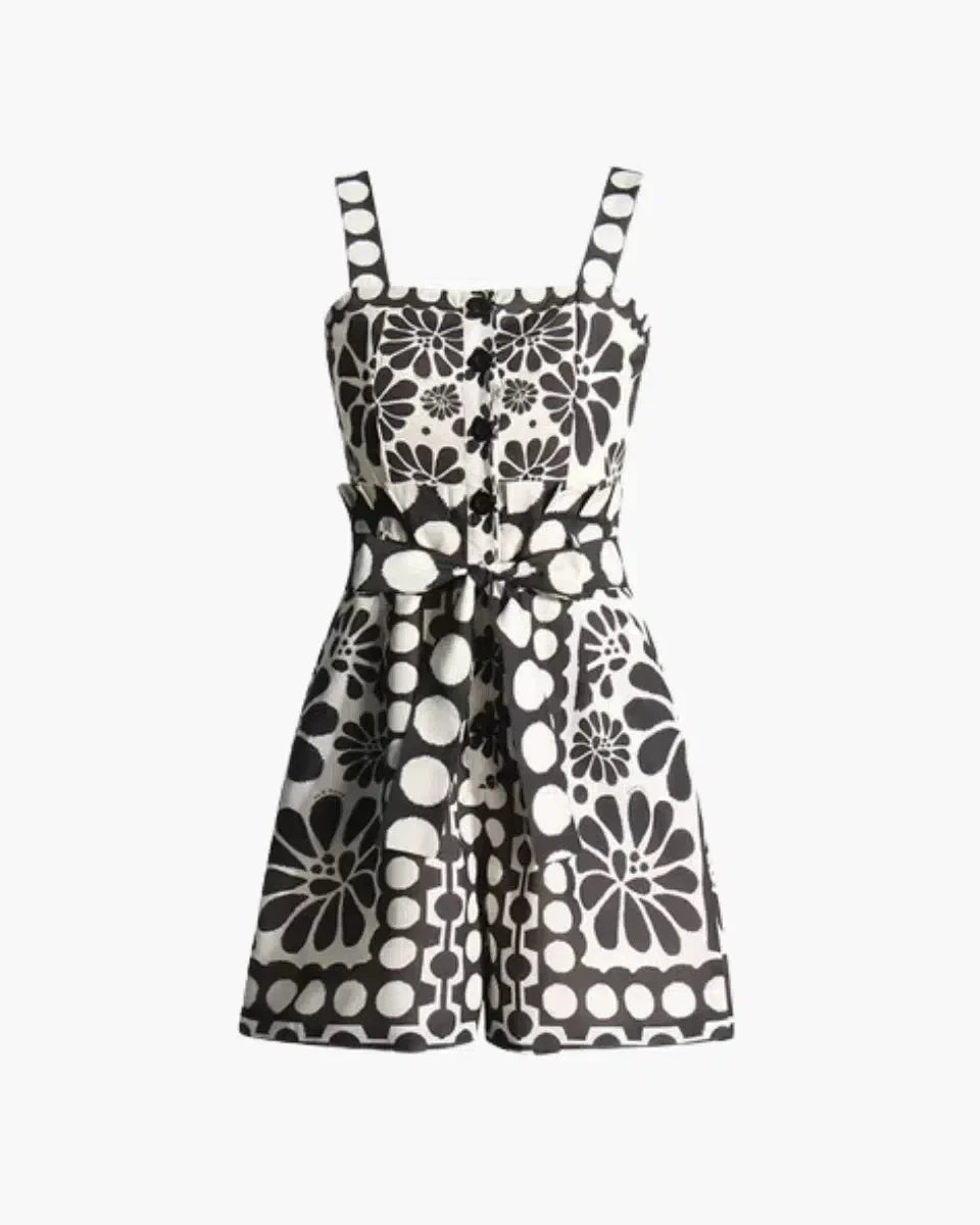 Vintage Floral Polka Dot Romper with Smocked Back, Square Neckline, and Slanted Pockets in Black and White