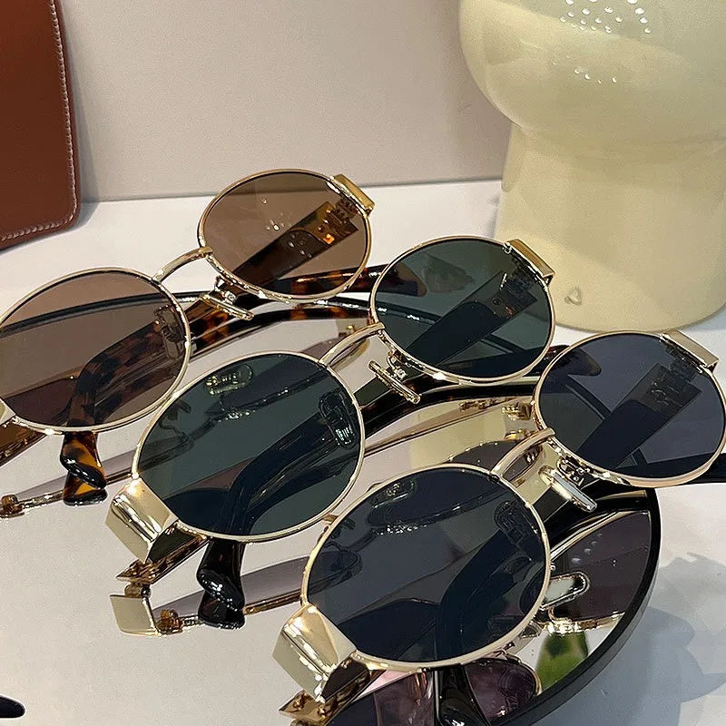 Lightweight women’s oval sunglasses – metal frame, UV400 protection, for everyday wear