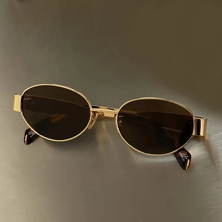 Lightweight women’s oval sunglasses – metal frame, UV400 protection, for everyday wear