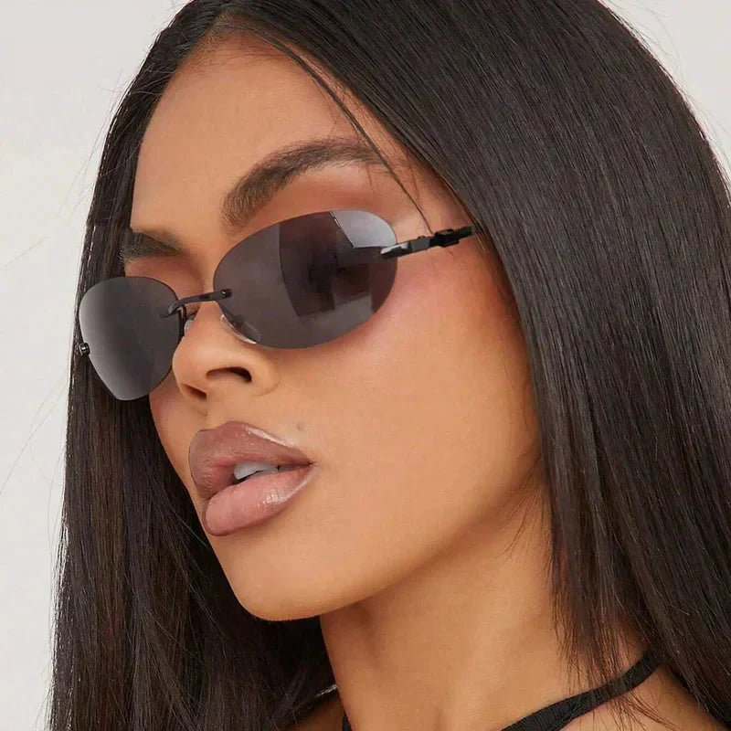 Lightweight unisex oval sunglasses – rimless design, high-quality plastic, for beach and city
