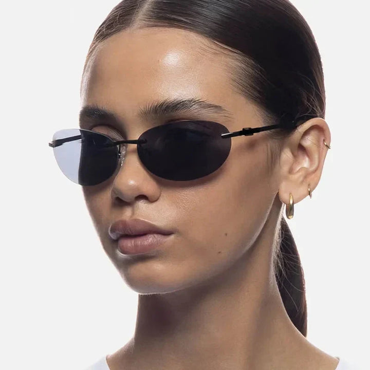 Lightweight unisex oval sunglasses – rimless design, high-quality plastic, for beach and city
