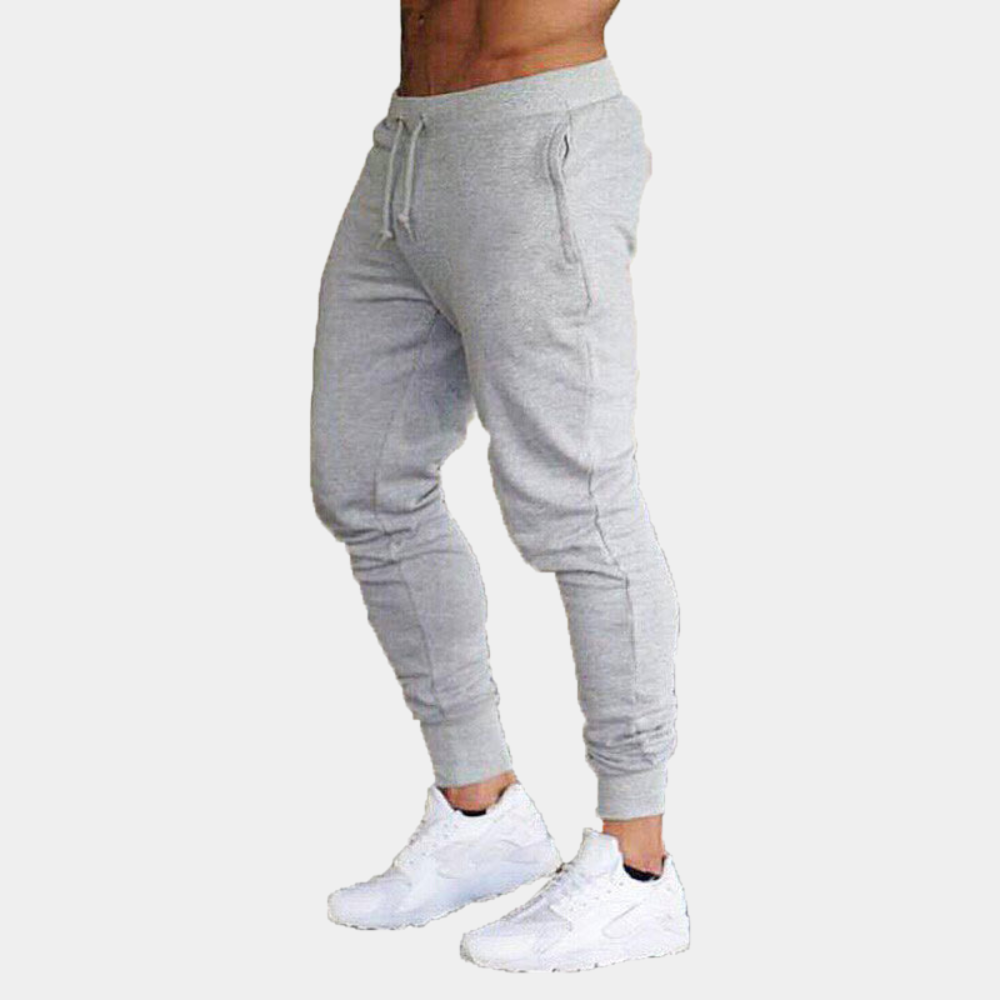Lightweight &amp; supportive men’s training pants – fitted design, breathable polyester, for summer workouts