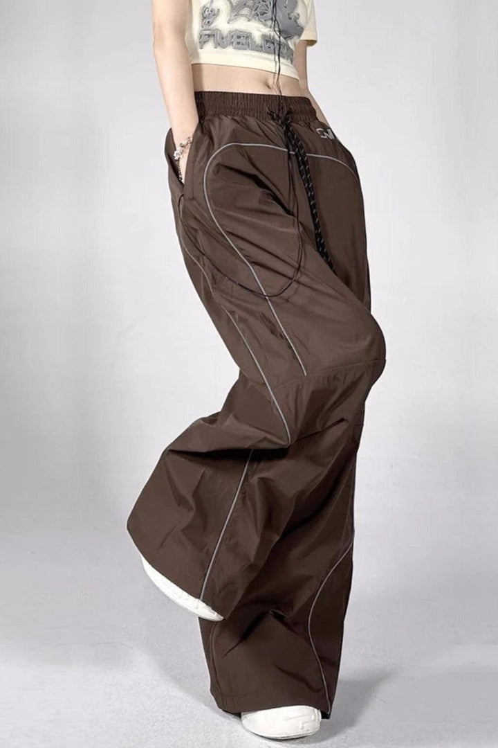 Brown Parachute Pants with Adjustable Drawcord, Six-Pocket Design, Oversized Fit for Casual and Urban Wear