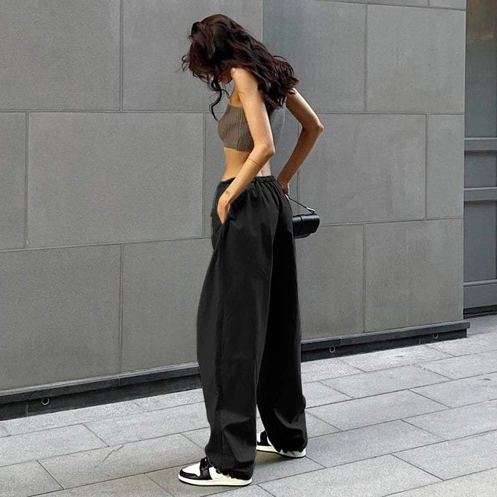 Black Parachute Pants with Adjustable Waist, Multiple Pockets, Lightweight Fabric for Casual and Urban Style