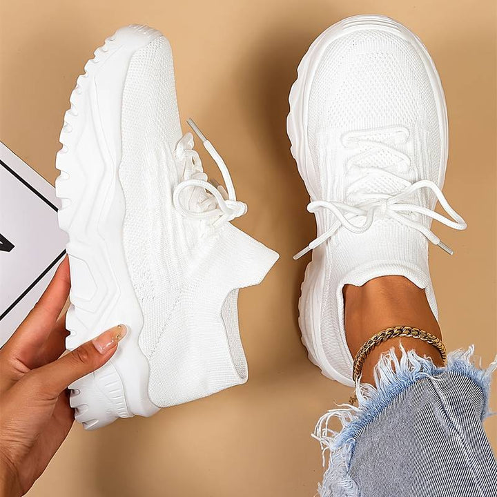 Supportive women’s sneakers – lightweight, breathable material, for walking and all-day comfort