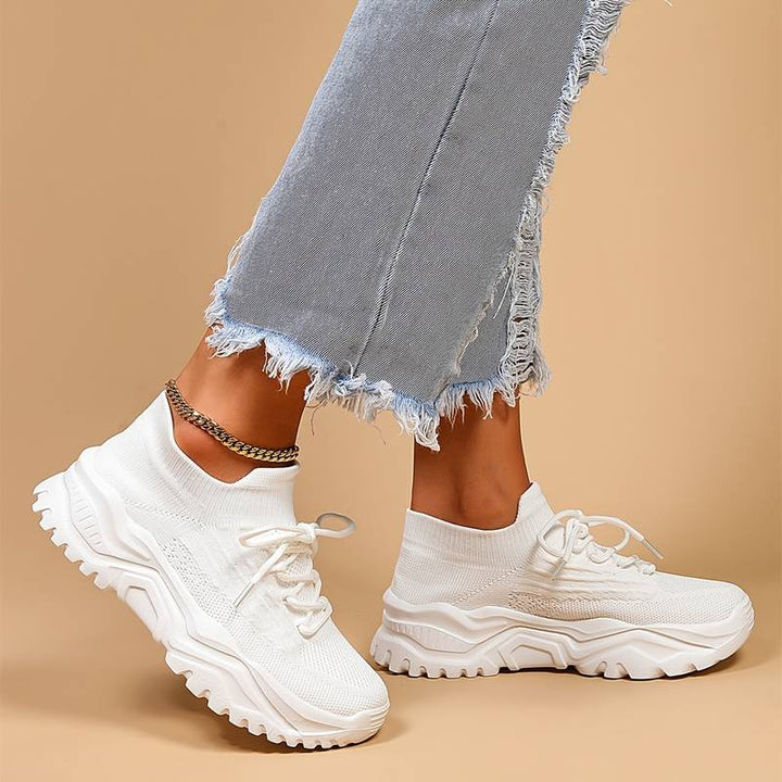 Supportive women’s sneakers – lightweight, breathable material, for walking and all-day comfort