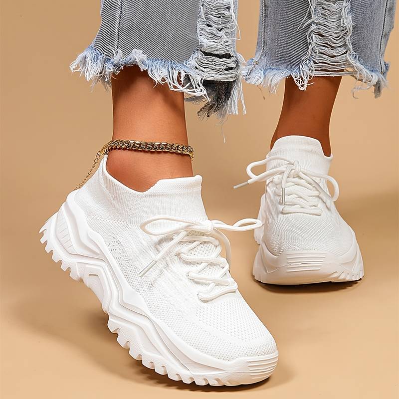 Supportive women’s sneakers – lightweight, breathable material, for walking and all-day comfort
