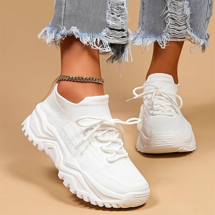 Supportive women’s sneakers – lightweight, breathable material, for walking and all-day comfort