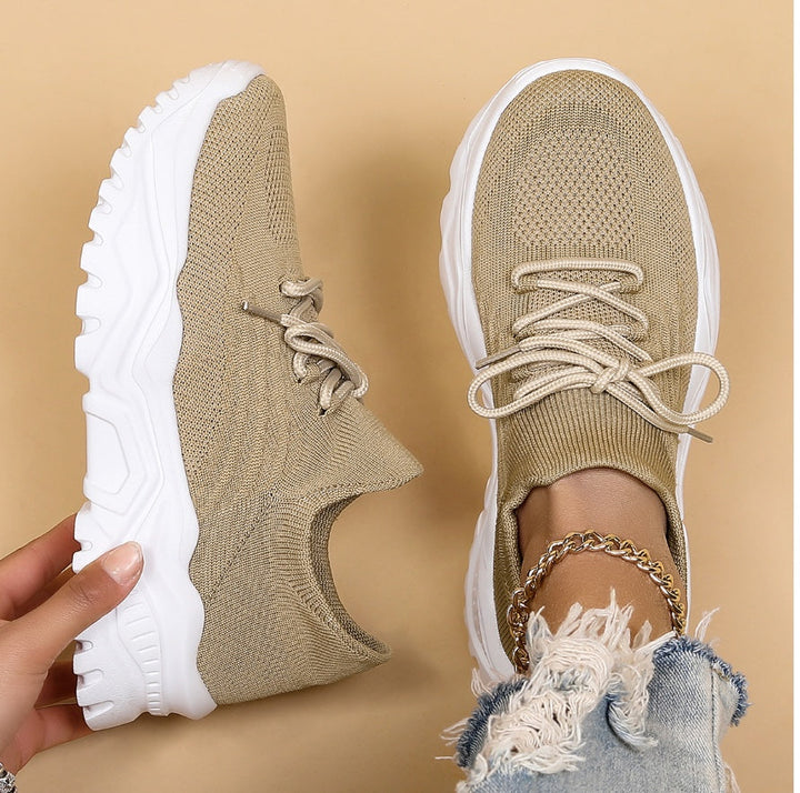 Supportive women’s sneakers – lightweight, breathable material, for walking and all-day comfort