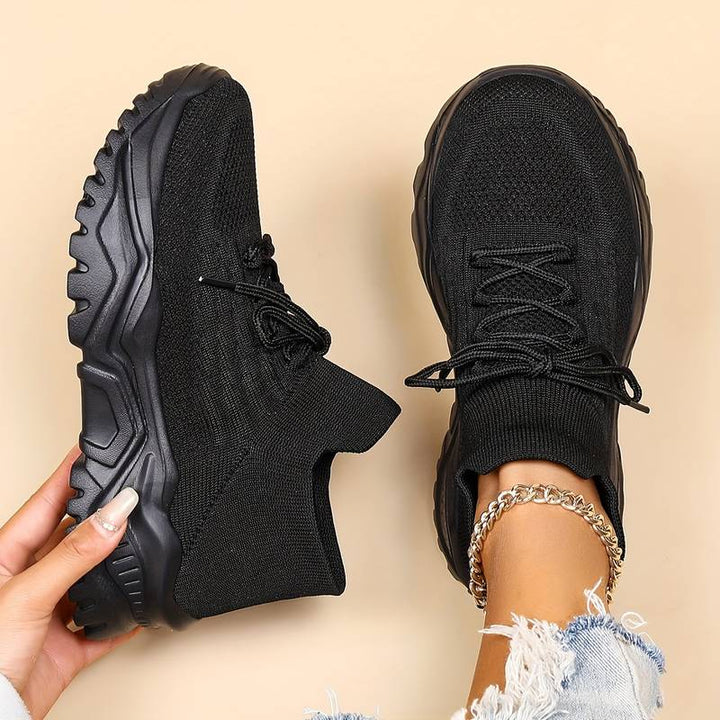 Supportive women’s sneakers – lightweight, breathable material, for walking and all-day comfort