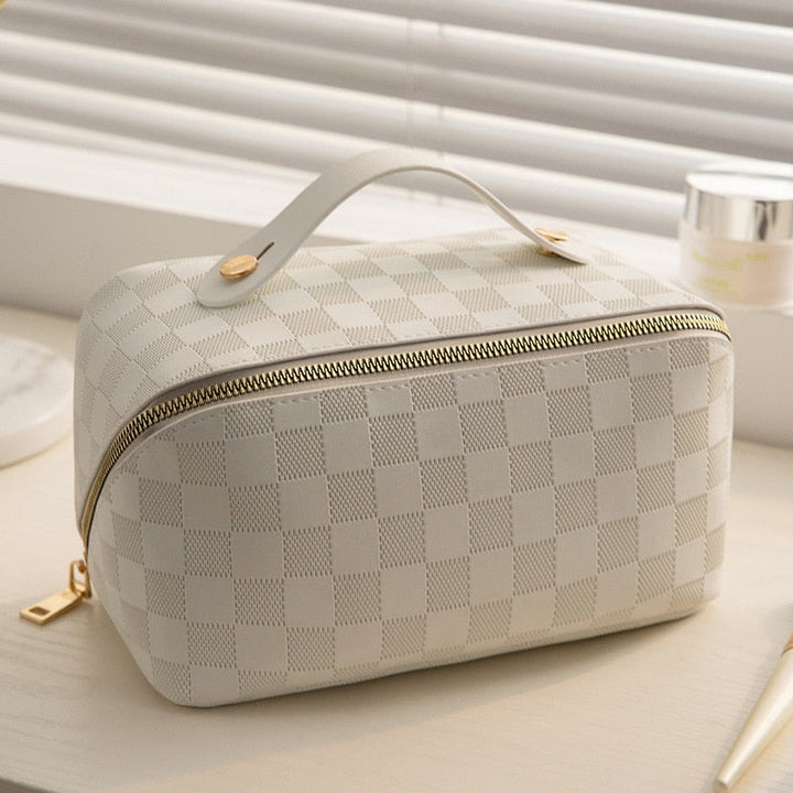 Waterproof women’s travel toiletry bag – spacious plaid design, durable materials, for beauty essentials